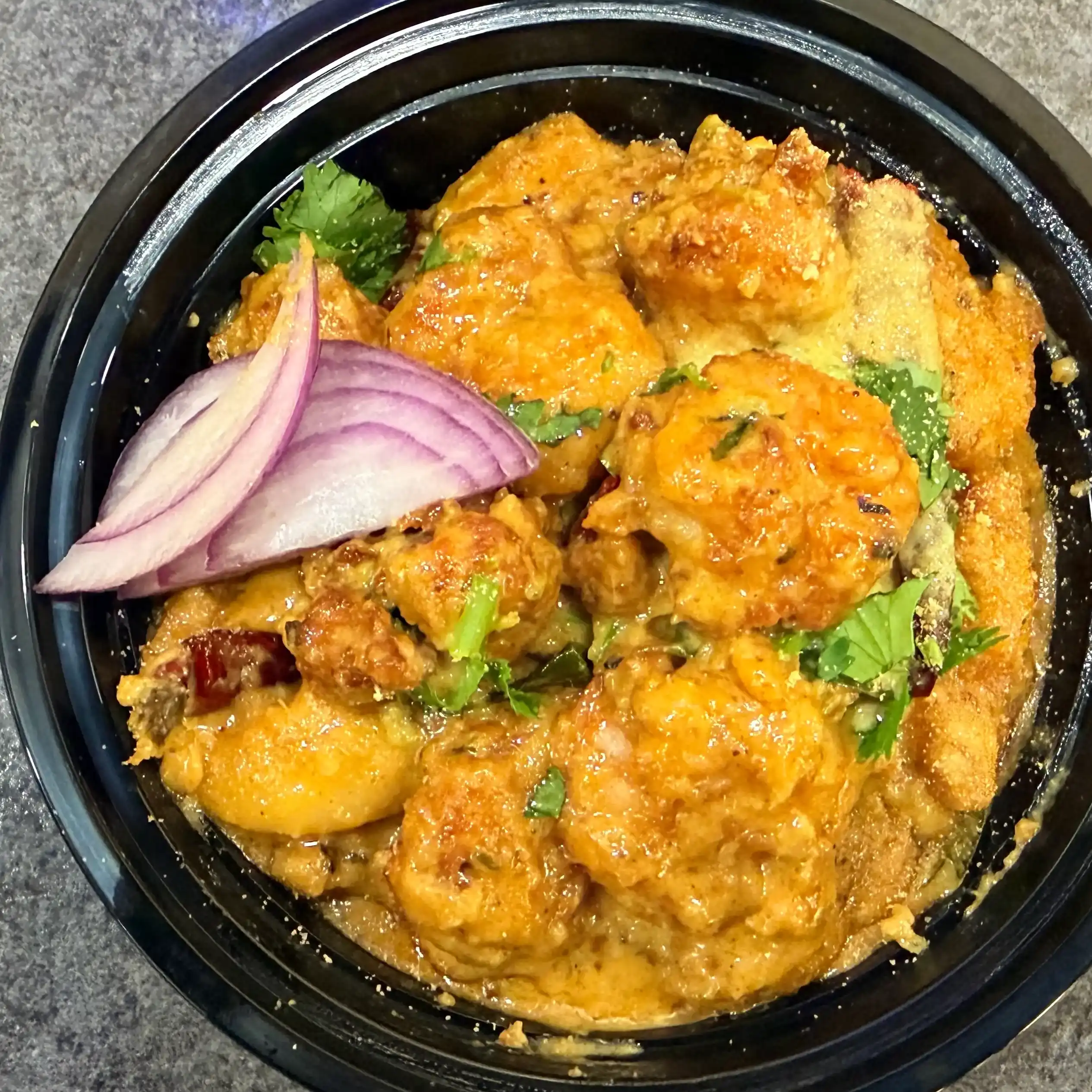 Creamy Garlic Shrimp — Succulent shrimp are lovingly enveloped in a velvety, rich garlic cream at Hashtag India, Overland Park